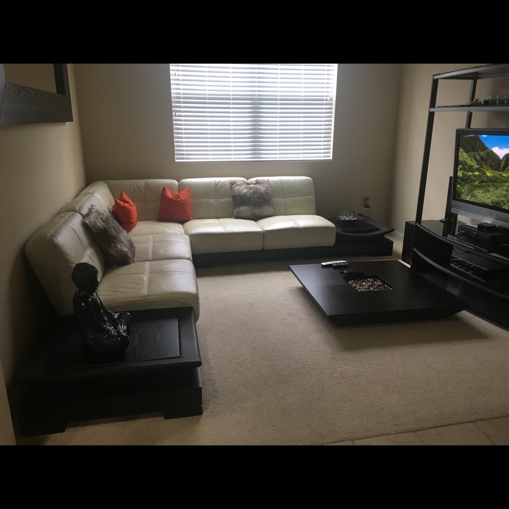 By Design leather living room set